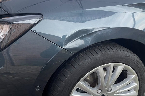 dent in front wing before repair - Stockport Smart Repair Gallery